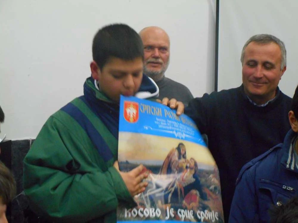 ПОДЕЛА НОВОГОДИШЊИХ ПАКЕТИЋА У ПОЖЕГИ — фотографија 14